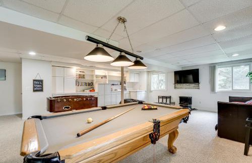 Commerce Township House | Game Room and Fire Pit Canal-Front Commerce Home