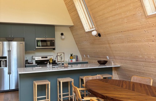 Story Cabin | Garden Lane A-frame cabin right on Irons Fork river