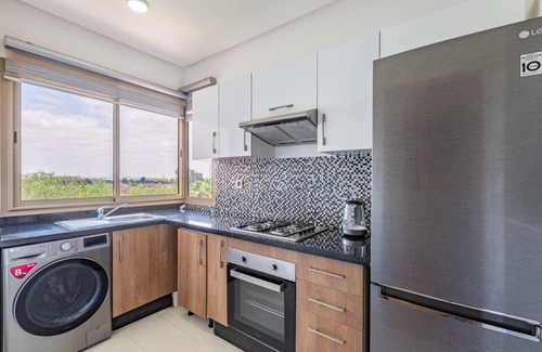Menara Apartment | Garden & pool view - 3 rooms 10min to town center