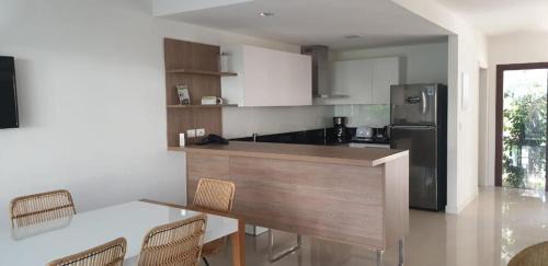 Solanas Apartment | GARDENS VIEW DUPLEX CON PARRILERO y CRYSTAL BEACH