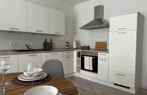 Rustersiel Apartment | Garten-Wohnung am Hafen von WHV