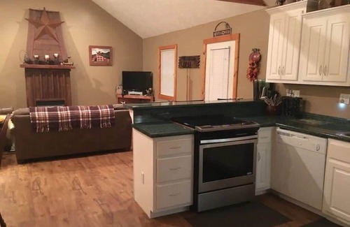 Spencer Cabin | Gas fireplace, firepit, and cedar Adirondack chair