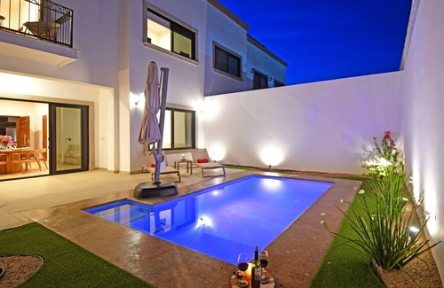 Esterito House | Gated 3BD+Office/flex bedroom, Sleeps 8, HTD Pool, Rooftop, 2 Blks to Malecon