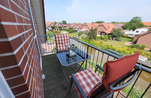 Greetsiel Apartment | Gemütliche Wohnung Grachtenidyll OG an den Greetsieler Grachten