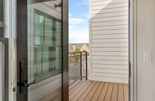 Holland Condo | George 202: Modern 8th Street Condo with City-View Balcony