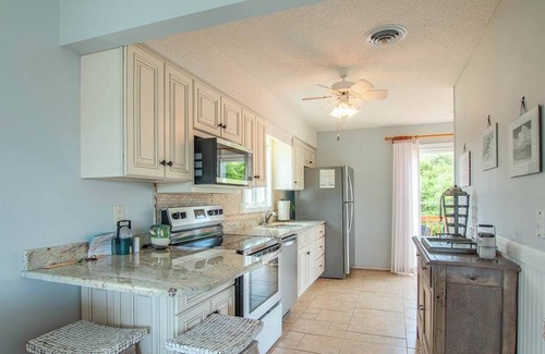 Sea Acres House | Georgetown Sands condo with WiFi, outdoor shower, and access to community pool and tennis