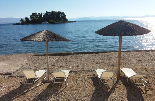 Perama Villa | Gerald Durell Pink Strawberry Pool Villa