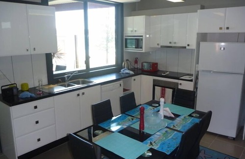 Bulli Apartment | GETWUNTOO on beautiful Sandon Point beach Bulli . Entire Top floor of house