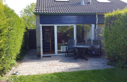 Bruinisse Condo | Gezellig vakantiehuisje vlakbijhet Grevelingenmeer, huisdieren toegestaan.