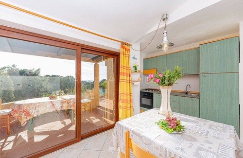 Costa Paradiso Villa | Ginepro Arancione: in front of the pool