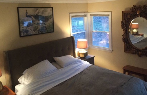 Milford House | Glacial lake on top of mountain, boats, floating dock, fishing, swimming, beach.