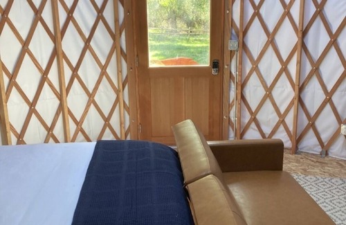 Montrose Cabin | Glamp in style in our 16' yurt, situated on Cedar Creek.