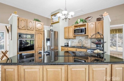 Hendersonville House | Glass House in the mountains of Hendersonville, NC with a hot tub.