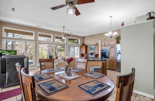 Hendersonville House | Glass House in the mountains of Hendersonville, NC with a hot tub.