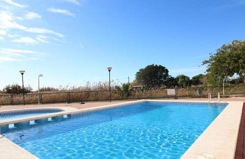 Playa de Almarda Apartment | Global Properties, Apartamento en Marjal de Corinto con Piscina