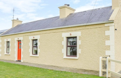 Inishmacatreer Cottage | GLOR COTTAGE, pet friendly, with a garden in Knock, County Mayo