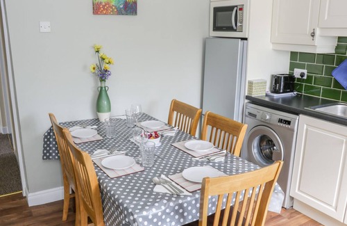 Connacht Cottage | GLOR COTTAGE, pet friendly, with a garden in Knock, County Mayo