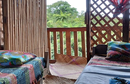Tanna Island House | Glowing Mountain view tree house