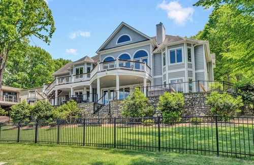 North Shore House | Go Jump In the Lake! Just Listed Custom Lakefront Home with Dock & Amenities!