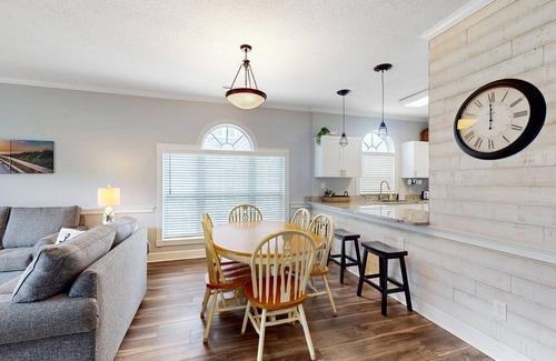 Central Myrtle Beach Condo | Golf course view condo with private balcony, W/D, pool & close to beach