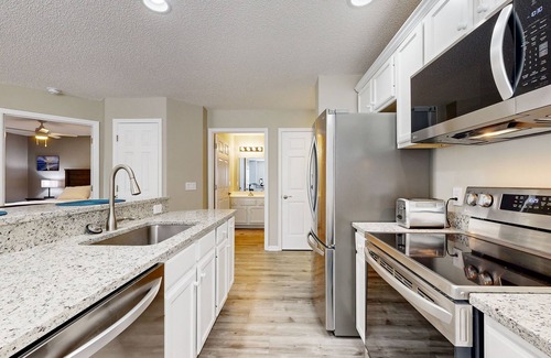 St. James Condo | Golf course view home with patio, close to ocean and beach access