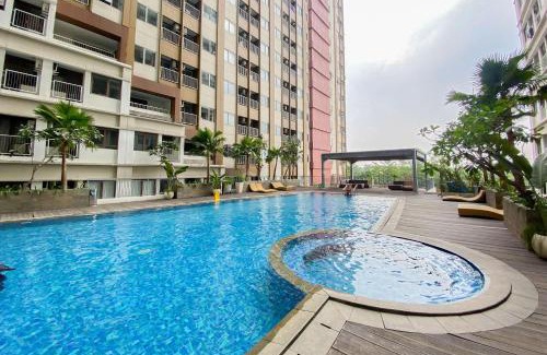 Duren Sawit Apartment | Good and Homey Studio at Gateway Park LRT City Jatibening Apartment By Travelio