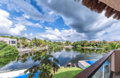 Puerto Aventuras Condo | Gorgeous 3 Bdrm Lagoon Condo Pool Wifi Kayak paddle boards Golf Cart Available