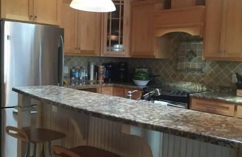 Madison Lake House | Gorgeous 4 BR lake home with beachside cabana!