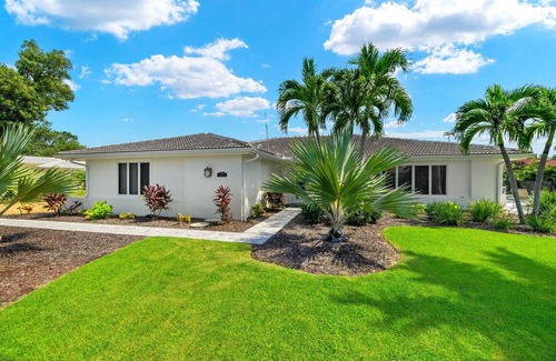 Shell Harbor House | Gorgeous canal front home walking distance to the beach!