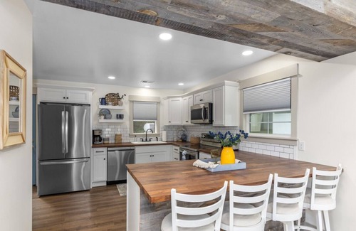 Greenville Cottage | Gorgeous Cottage on Wabasis Lake. Pontoon included & pet friendly!