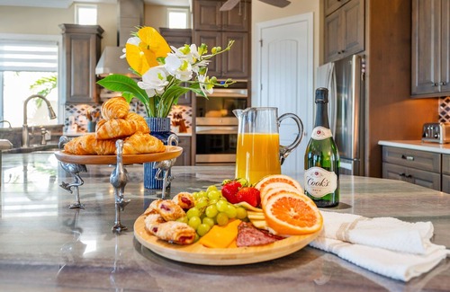 Cocoa Isles Country Club House | Gorgeous Direct Riverfront Pool Home W/Private Balcony, Movie Room, & Fire Pit!