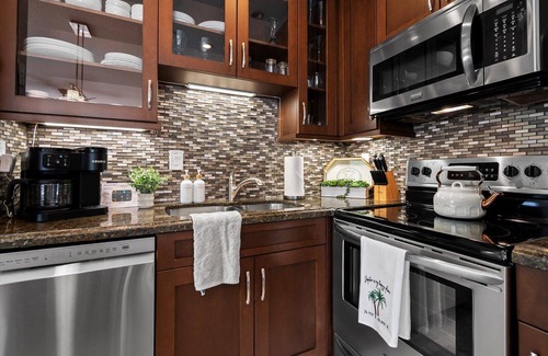 Jupiter Condo | Gorgeous Jupiter Bay Resort villa, only steps to the beach and pool!