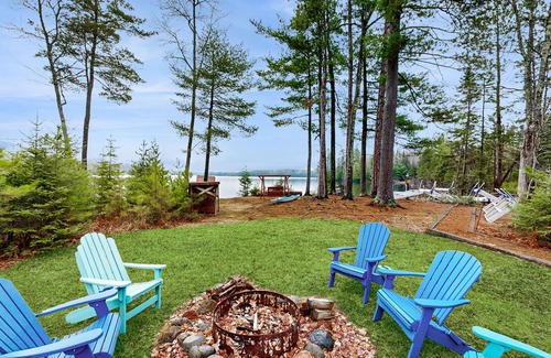 Three Lakes House | Gorgeous lakefront lodge with dock, deck, game room & firepit