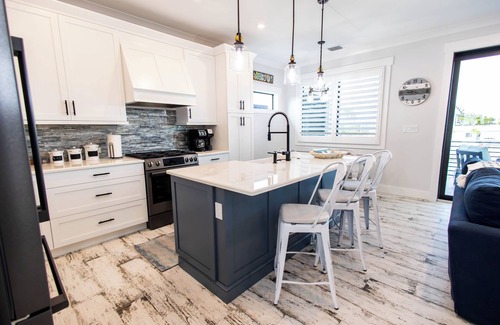 Cudjoe Gardens House | Gorgeous new build on Cudjoe Marina Basin with 80 ft boat dock and private pool