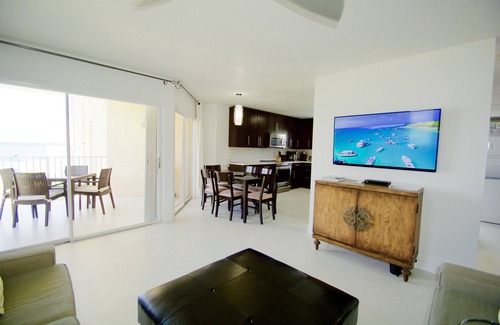 Seven Mile Beach Condo | Gorgeous Ocean Views! In the Center of 7 Mile Beach! Walk to Most Everything!