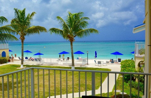Seven Mile Beach Condo | Gorgeous Ocean Views! In the Center of 7 Mile Beach! Walk to Most Everything!