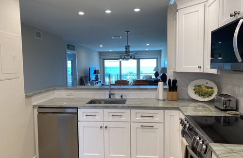Central Beach Condo | Gorgeous Ocean Views, Walk to Town, COMPLETE RENOVATION in 2023!