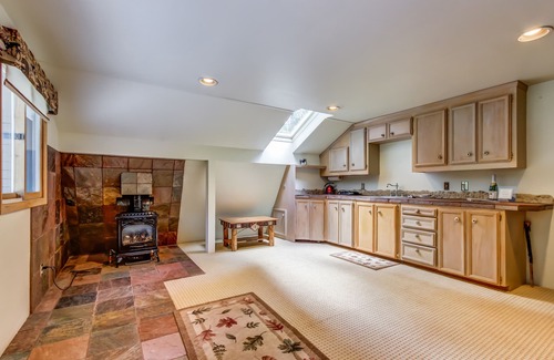 Trout Lake House | Gorgeous Riverfront Home & Guesthouse with Deck, Firepits & Media Room