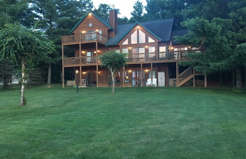 Shell Lake Cabin | Gorgeous Sunset View & Sandy Beach on Shell Lake with Game Room!