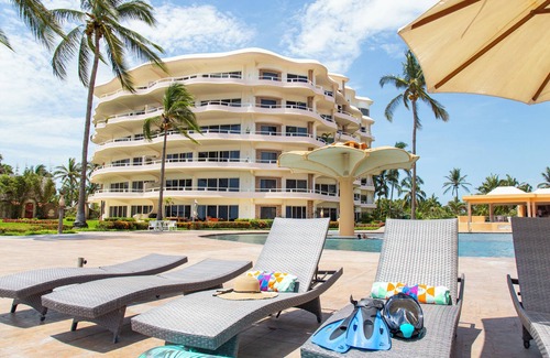 Flamingos Villa | Gorgeous Two-Story Penthouse Private Community on the Beach!