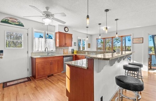 North Shore Acres House | Gorgeous views on large, quiet cove just off Main Lake.