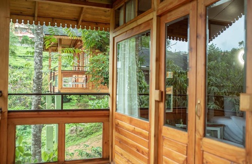 Kuttikkanam Ski Chalet | Granary Experience - Wooden Chalet in a plantation