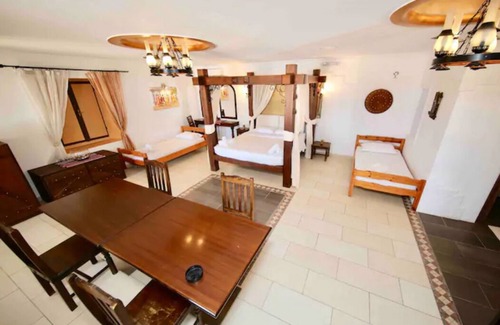 Perivolos Resort | GRAND ROYAL SUITE ON THE BEACH