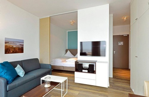 Wangerooge Apartment | Great apartment on the beach with direct sea view, balcony and sauna in the house! -