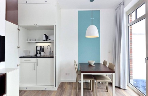 Wangerooge Apartment | Great apartment on the beach with direct sea view, balcony and sauna in the house! -