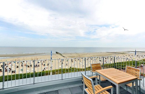 Wangerooge Apartment | Great apartment on the beach with direct sea view, balcony and sauna in the house! -