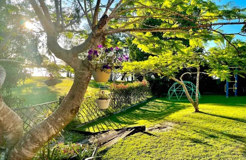 Yamba House | Great for families! “River Palm” Spacious, private, riverside retreat.