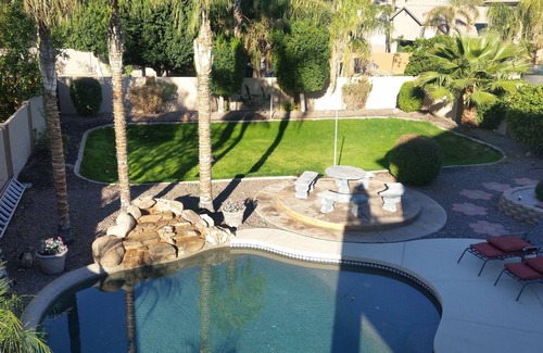 Chandler House | Great House with a jacuzzi, pool, outdoor fireplace & a large backyard!