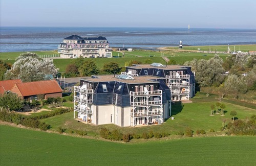 Wremen Apartment | Great vacation apartment with sauna, south-facing balcony, beach chair and beautiful