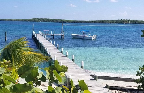 Lubbers Quarters Cay House | Green Bananas Cottage with sandy beach and private dock